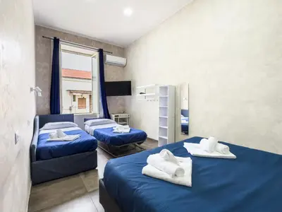 Letto o letti in una camera di Dimora dei Sogni