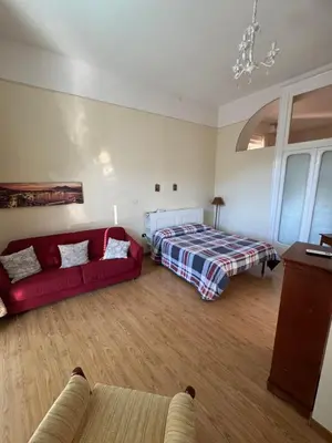 Letto o letti in una camera di casa vacanze a casa di ciro