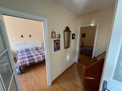 Letto o letti in una camera di casa vacanze a casa di ciro