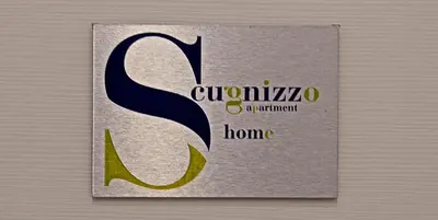 Certificato, attestato, insegna o altro documento esposto da Scugnizzo Apartment Luxury Home