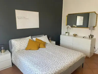 Letto o letti in una camera di MammaRo's House