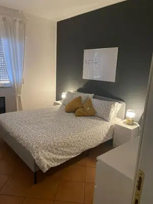 Letto o letti in una camera di MammaRo's House
