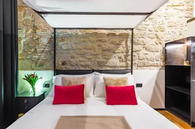 Letto o letti in una camera di Palazzo Residenza Madre by Dimorra