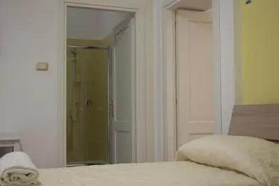 Letto o letti in una camera di Donna Laura Suite