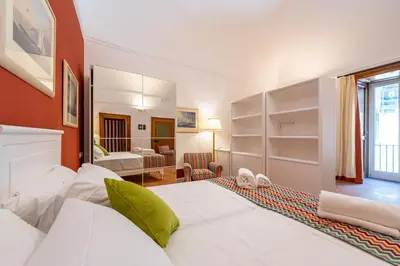Letto o letti in una camera di Corte Satriano Residence