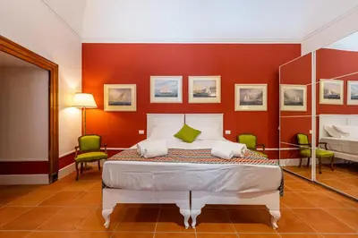 Letto o letti in una camera di Corte Satriano Residence
