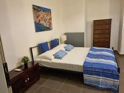 Letto o letti in una camera di Napoli Sottosopra Chiaia