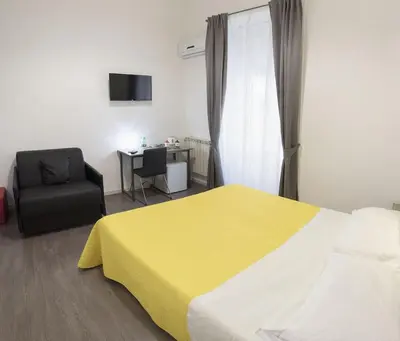 Letto o letti in una camera di Donna Luisa