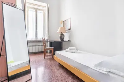 Letto o letti in una camera di Regal Santa Chiara By Dimorra