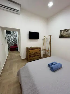 Letto o letti in una camera di Good Friends Home