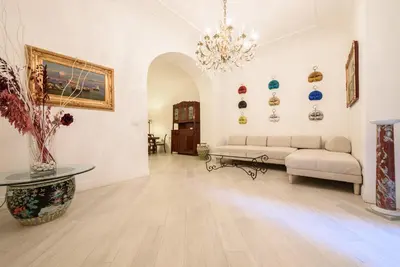 Letto o letti in una camera di Palazzo dello Spagnolo Suite