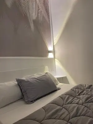 Letto o letti in una camera di B&B La Cumana