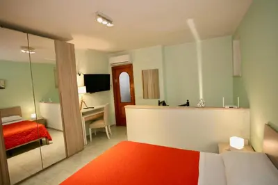 Letto o letti in una camera di La Terrazza di Napoli