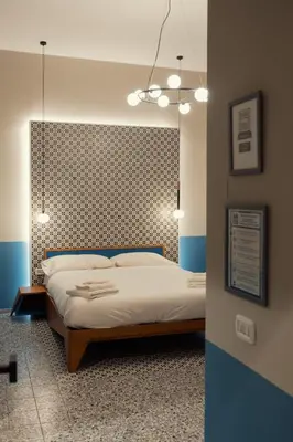 Letto o letti in una camera di Occhi di Napoli Experiential Relais