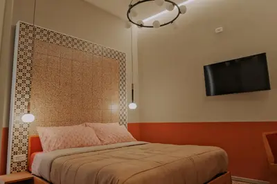 Letto o letti in una camera di Occhi di Napoli Experiential Relais