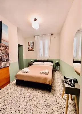 Letto o letti in una camera di Occhi di Napoli Experiential Relais