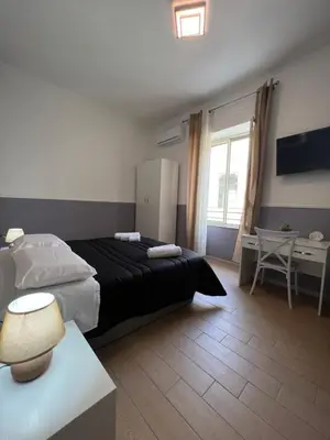 Letto o letti in una camera di Silvana Appartamento