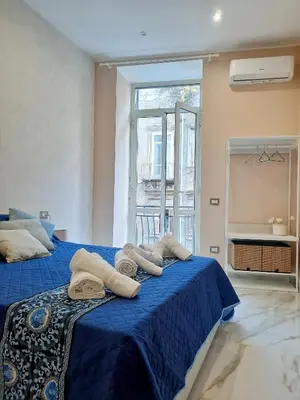 Letto o letti in una camera di Re Ferdinando Apartment