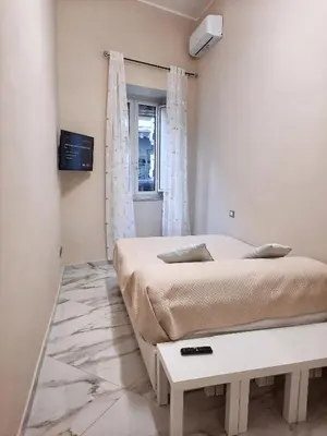 Letto o letti in una camera di Re Ferdinando Apartment