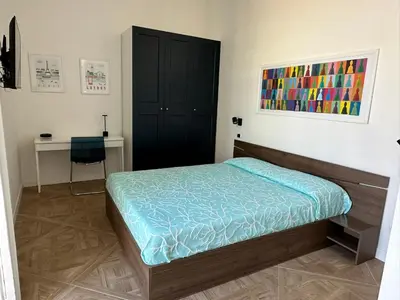 Letto o letti in una camera di CentrAntico - S. Chiara View