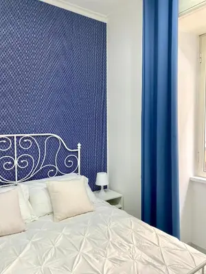 Letto o letti in una camera di Casa sulla nuvola Duomo cuore pulsante Napoli
