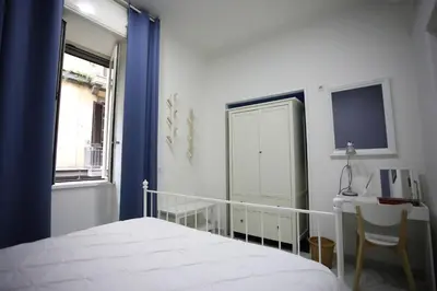 Letto o letti in una camera di Casa sulla nuvola Duomo cuore pulsante Napoli