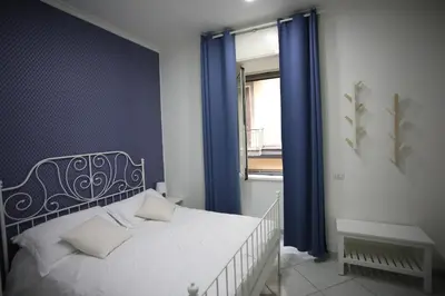 Letto o letti in una camera di Casa sulla nuvola Duomo cuore pulsante Napoli
