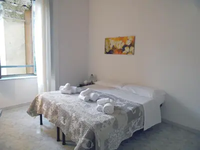 Letto o letti in una camera di Suite Donnaregina