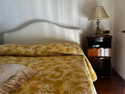 Letto o letti in una camera di Residenza Borgo Marinaro