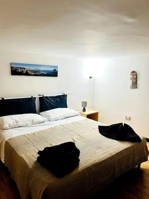 Letto o letti in una camera di Casa Emanuel