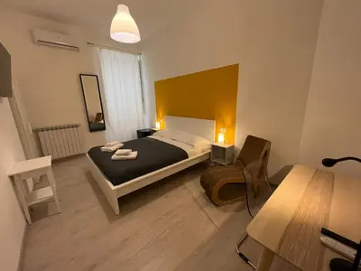 Letto o letti in una camera di Donna Luisa a Santa Chiara