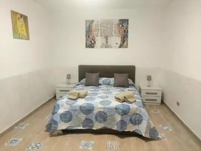 Letto o letti in una camera di Casa relais