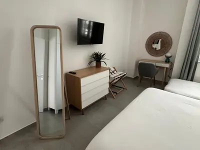 Letto o letti in una camera di Cosmo 38 Luxury Apartments - Free Parking