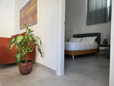 Letto o letti in una camera di Cosmo 38 Luxury Apartments - Free Parking