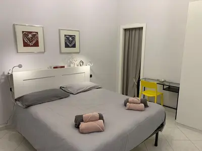 Letto o letti in una camera di Orefici24
