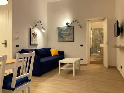 Area soggiorno di La Casa Blu un oasi di tranquillità nel vivace cuore di Napoli