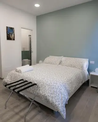 Letto o letti in una camera di Dimora Cavour
