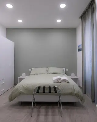 Letto o letti in una camera di Dimora Cavour