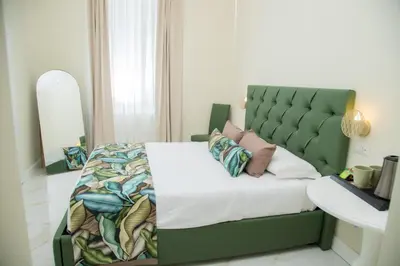 Letto o letti in una camera di Gentile Suite Centro Storico