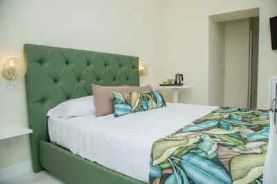 Letto o letti in una camera di Gentile Suite Centro Storico