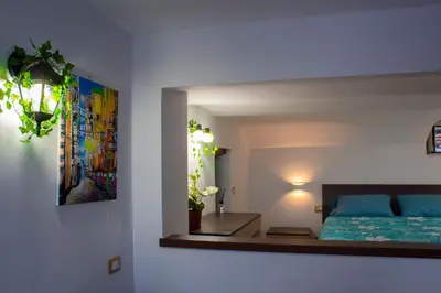 Letto o letti in una camera di GREGORIUS CHIRINGUITO