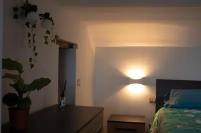 Letto o letti in una camera di GREGORIUS CHIRINGUITO