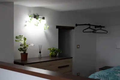 Letto o letti in una camera di GREGORIUS CHIRINGUITO