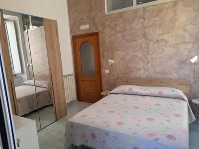 Letto o letti in una camera di IL VICOLETTO D'ORO