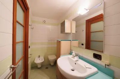 Bagno di The San Gregorio Armeno Apartment By HouseinNaples