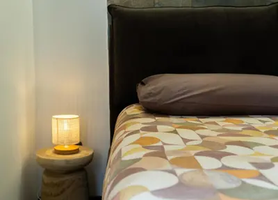 Letto o letti in una camera di ROOMITO apartments