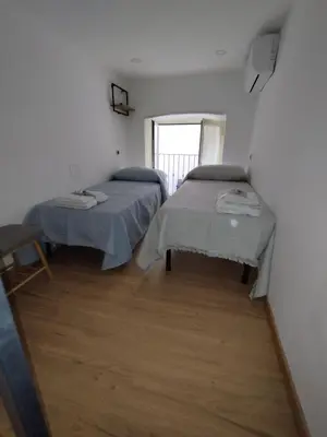 Letto o letti in una camera di IL Conte a Casa