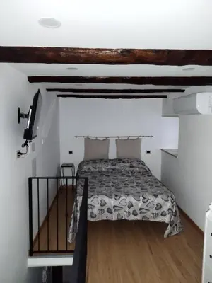 Letto o letti in una camera di IL Conte a Casa