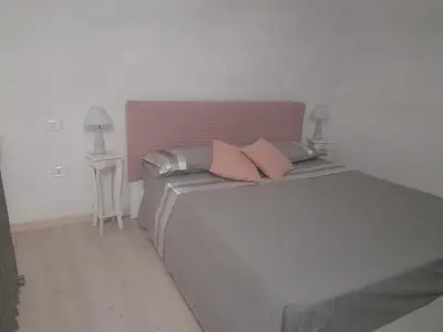 Letto o letti in una camera di Home Sweet home