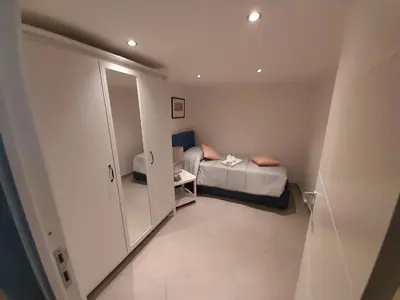 Letto o letti in una camera di Home Sweet home